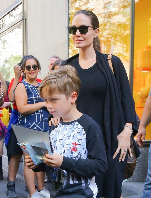 Angelina Jolie & Her Son Knox Shop At The Lego Store In NYC