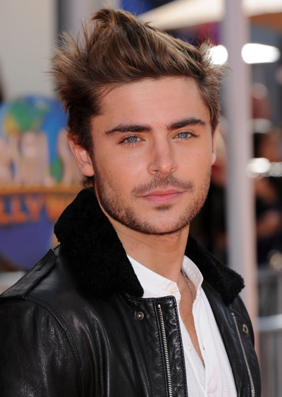 How Embarrassing! Zac Efron Drops A Condom Out Of His Pocket On The Red Carpet (Video)