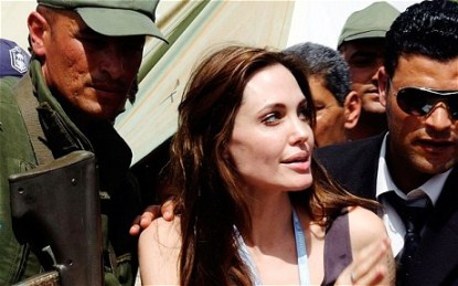 Angelina Jolie And Tattoo Makes Seven??