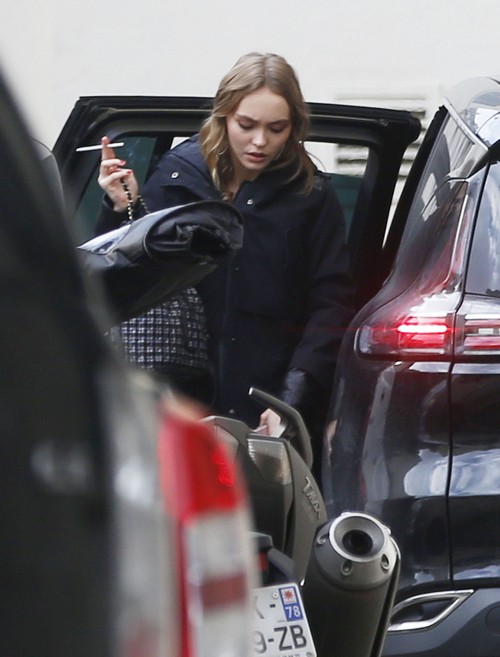 Lily-Rose Depp Smoking and Giving Paparazzi Dirty Looks In Paris Photos ...