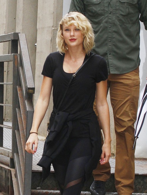 52166497 Newly single singer Taylor Swift wears an all black ensemble for the second day in a row while stepping out with her security in New York City, New York on September 7, 2016. Taylor could be in mourning after recently calling it quits with British actor Tom Hiddleston. FameFlynet, Inc - Beverly Hills, CA, USA - +1 (310) 505-9876
