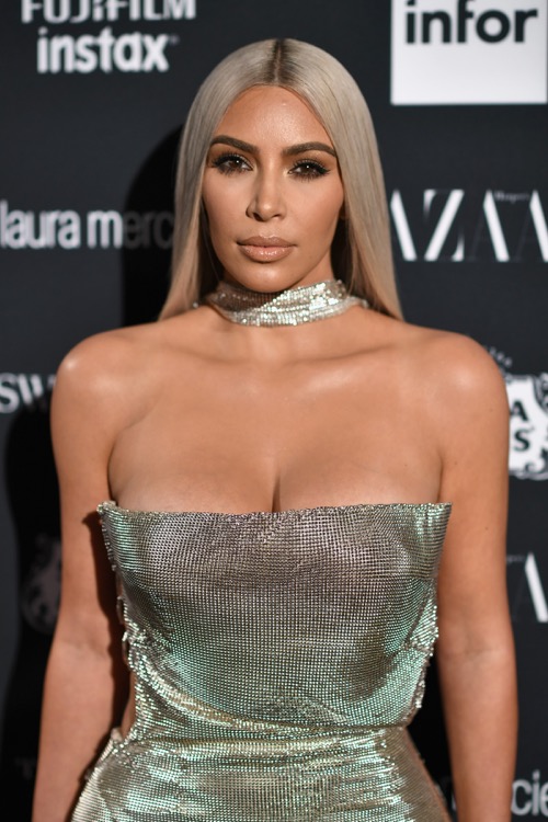 Kim Kardashian Promises To Cut Back On Posing Nude