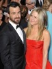 Jennifer Aniston Pregnant, Justin Theroux Cradles Baby Bump At Oscars 0225