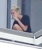 Miley Cyrus Smokes Weed On Balcony, Trying To Be Jennifer Lawrence For Liam Hemsworth? (Photos) 0407