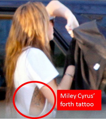 Miley Cyrus Adds To Her Body Art and Gets A Forth Tattoo