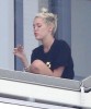 Miley Cyrus Smokes Weed On Balcony, Trying To Be Jennifer Lawrence For Liam Hemsworth? (Photos) 0407