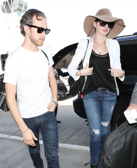 Anne Hathaway & Adam Shulman Departing On A Flight At LAX