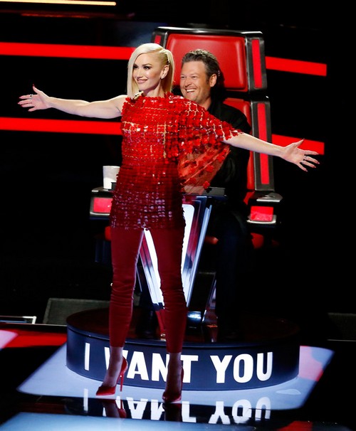 Gwen Stefani standing in front of Blake (who is in his chair), from an earlier season.