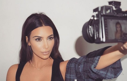 Kim Kardashian Claims Bikin Pics Photoshopped to Make Her Look Bad